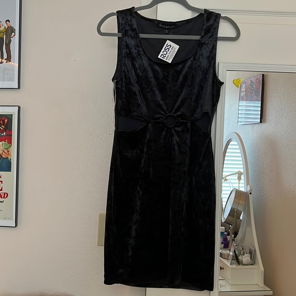 Black velvet dress with cut outs on the front sides